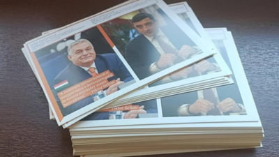George Simion a început să împartă pliante în care apare alături pe premierul maghiar Viktor Orban, fără a avea acordul din partea ungară